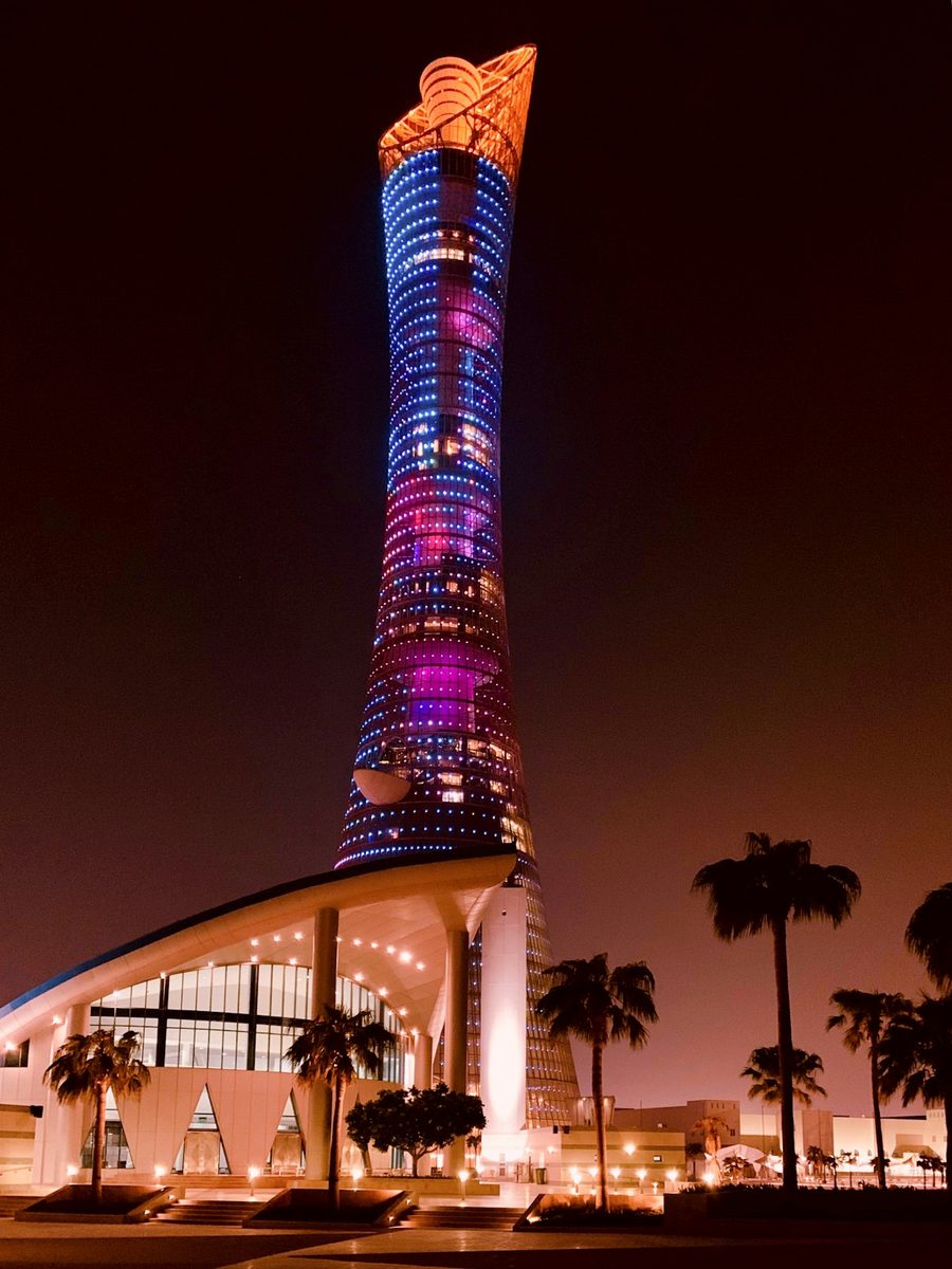 The Torch tower lit at night in Doha, Qatar